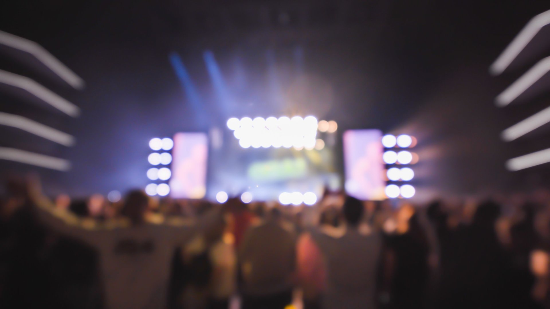 Rock am Ring Festival crowd with epic stage lighting